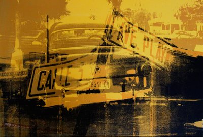 Yellow Car and Street Sign by David Studwell